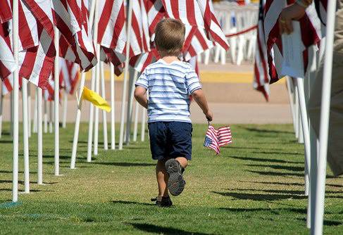 Little boy and flags